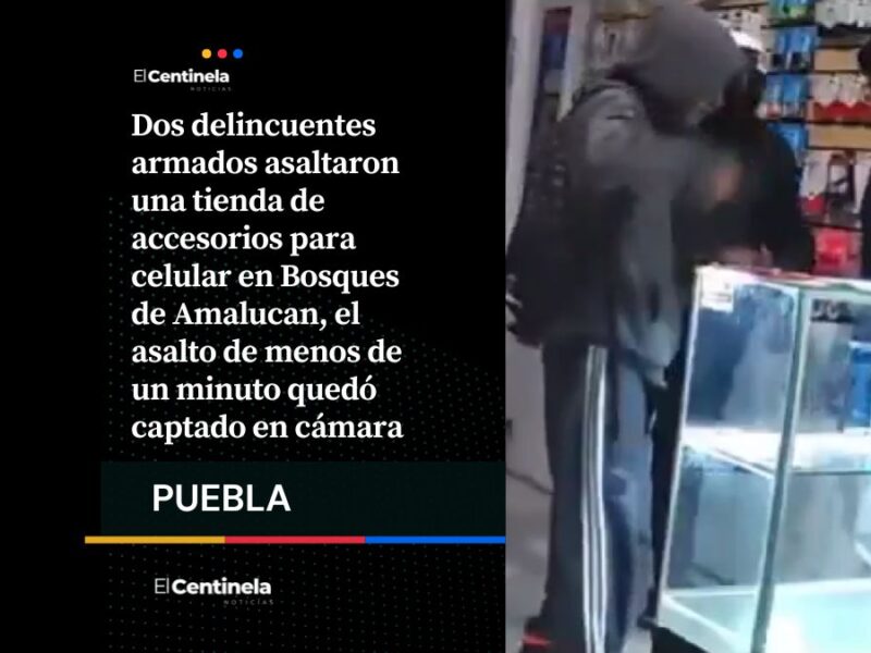 Dos delincuentes armados asaltaron una tienda de accesorios para celular en Bosques de Amalucan, el asalto de menos de un minuto quedó captado en cámara
